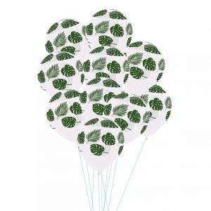 Globo transparente con hojas tropicales verdes