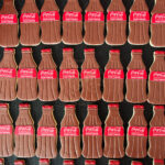 Galletas corporativas coca-cola con forma de botella