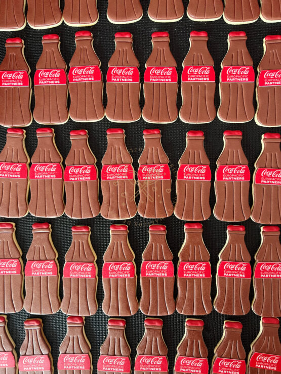 Galletas corporativas coca-cola con forma de botella