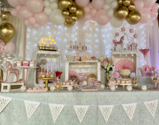 Candy bar bautizo tonos rosa y dorado